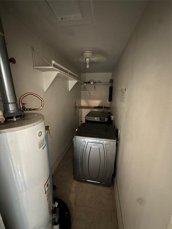 2741 Mill Street Ringgold, LA 71068 - Photo 21 of 30 a view of storage and utility room with washer and dryer