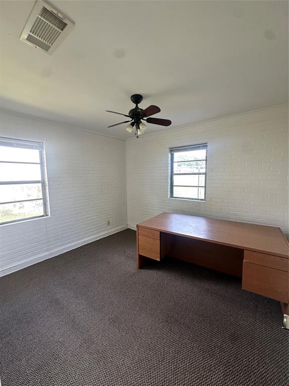2741 Mill Street Ringgold, LA 71068 - Photo 24 of 30 a spacious bedroom with a bed and a window
