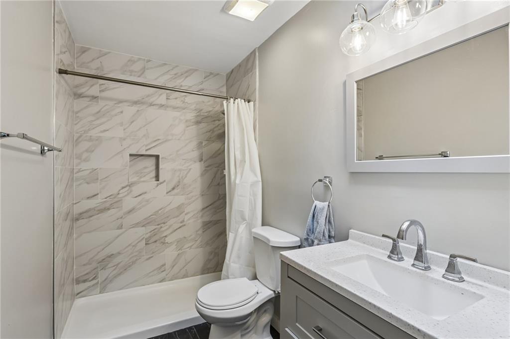 2772 Clearview Road Allison Park, PA 15101 - Photo 19 of 43 a bathroom with a sink toilet and shower