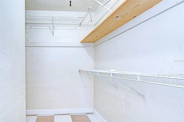 a view of a room with racks on the wall