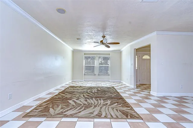 a view of an empty room and window