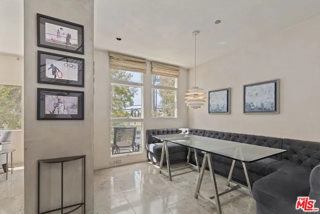 a workspace with furniture and window