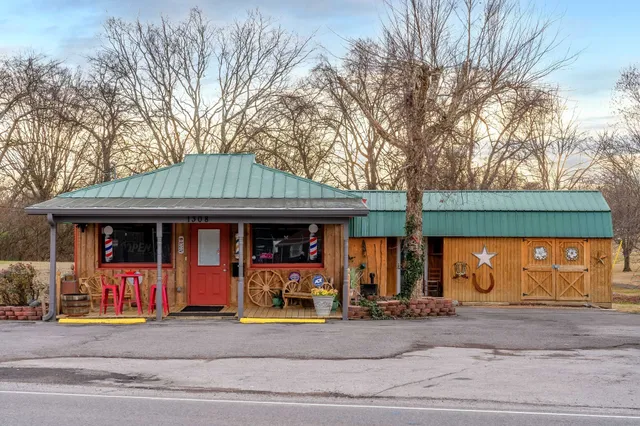 a front view of a house with lots of space and garage