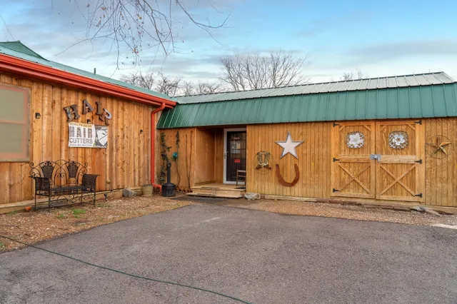 a view of a house with a potted plant