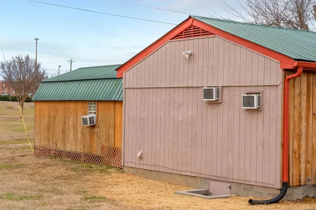 a view of a ocean with furniture