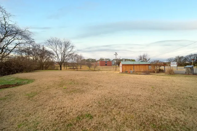 a row of car parked on the side of the road