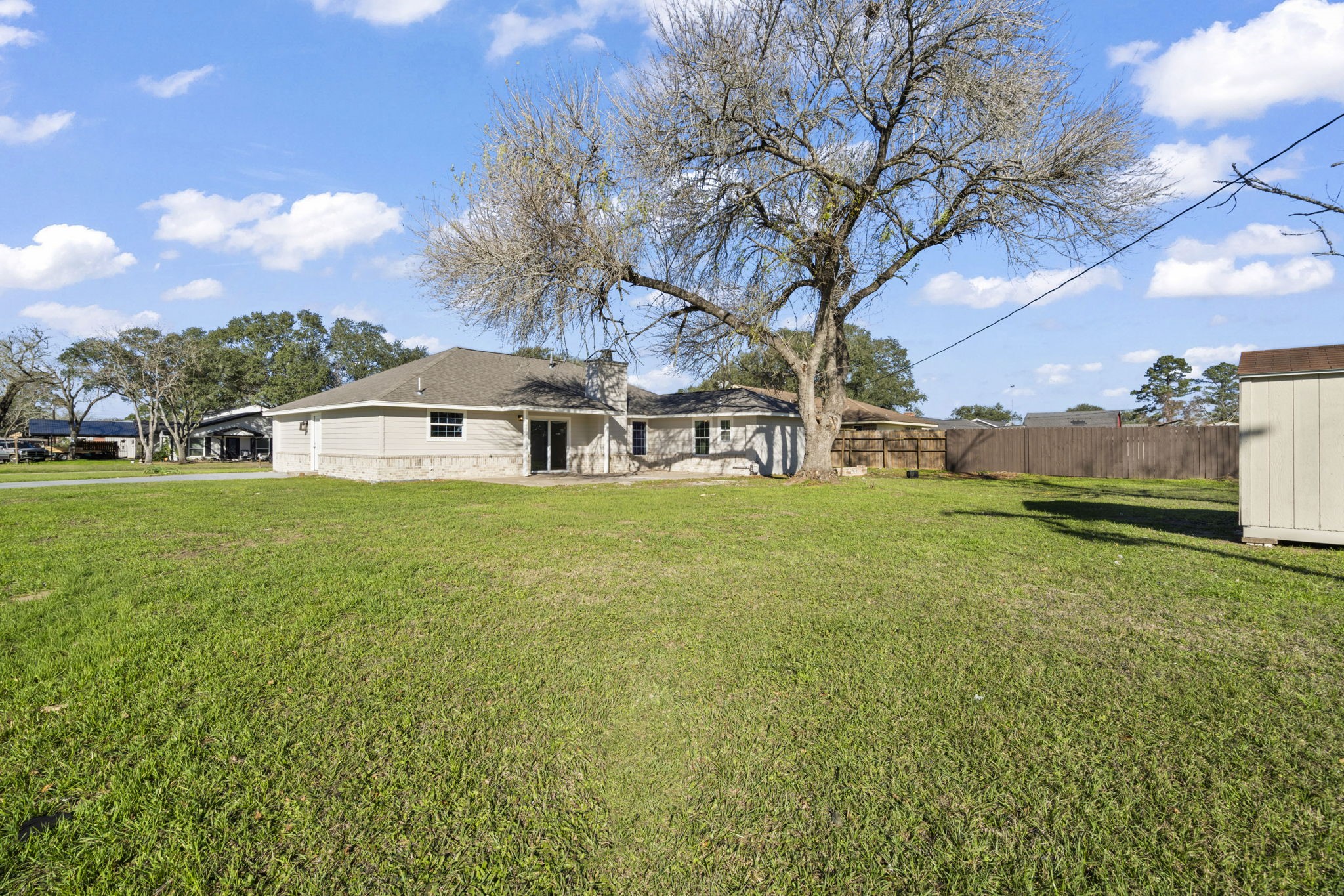 1740 6th Street Hempstead, TX 77445 - Photo 13 of 21 a view of a house with a yard