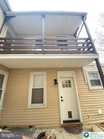 a view of a house with street
