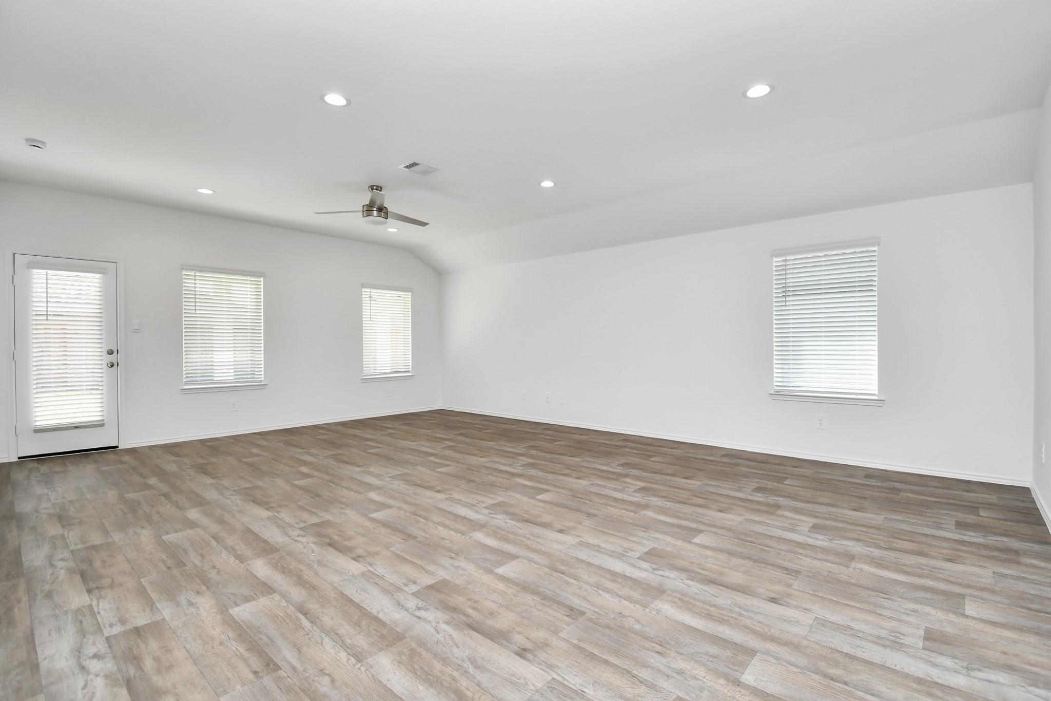 2715 Willow Gulch Way Rosenberg, TX 77469 - Photo 21 of 39 a view of empty room with wooden floor and fan