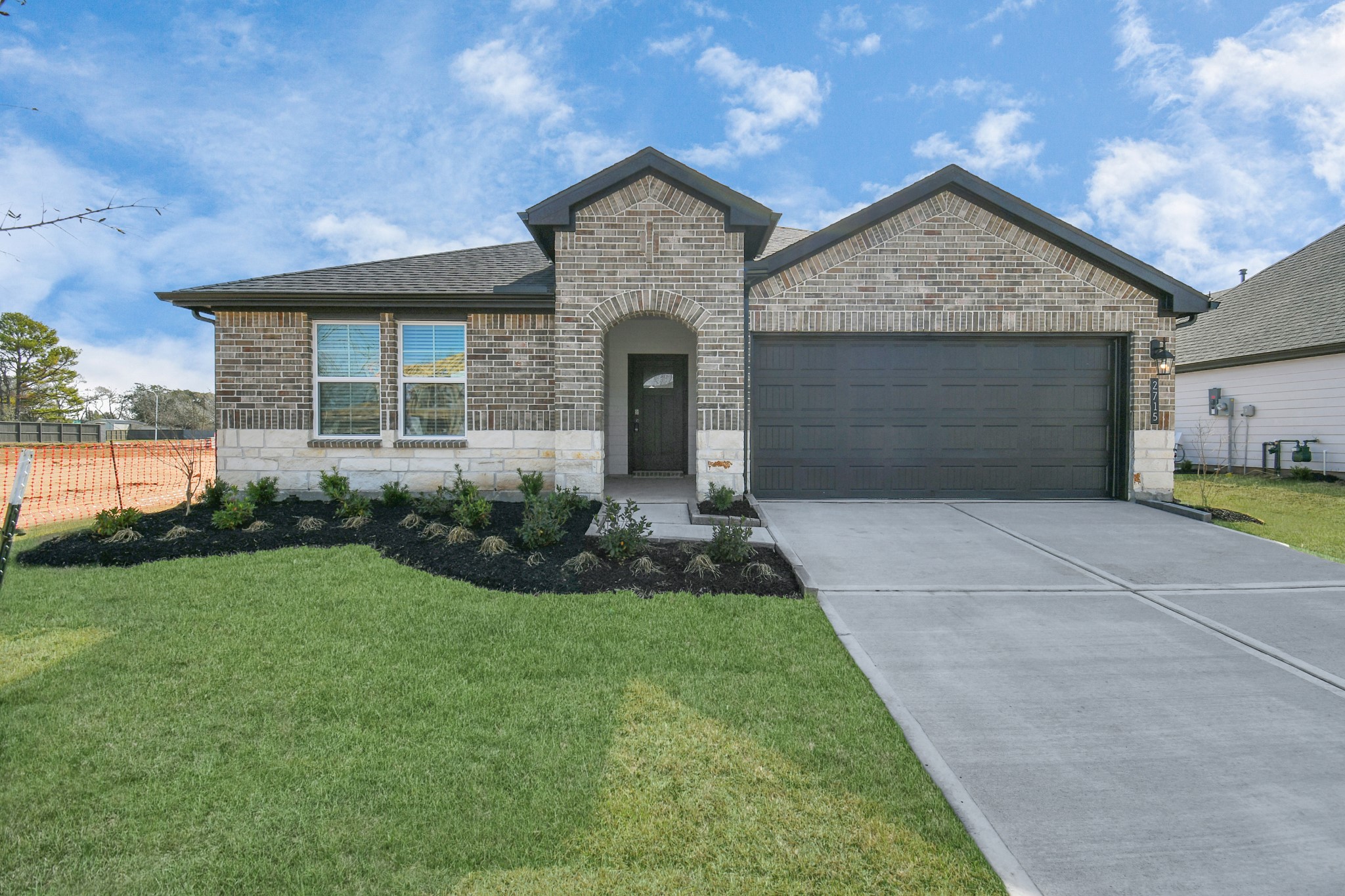 2715 Willow Gulch Way Rosenberg, TX 77469 - Photo 27 of 39 a front view of a house with a yard and garage