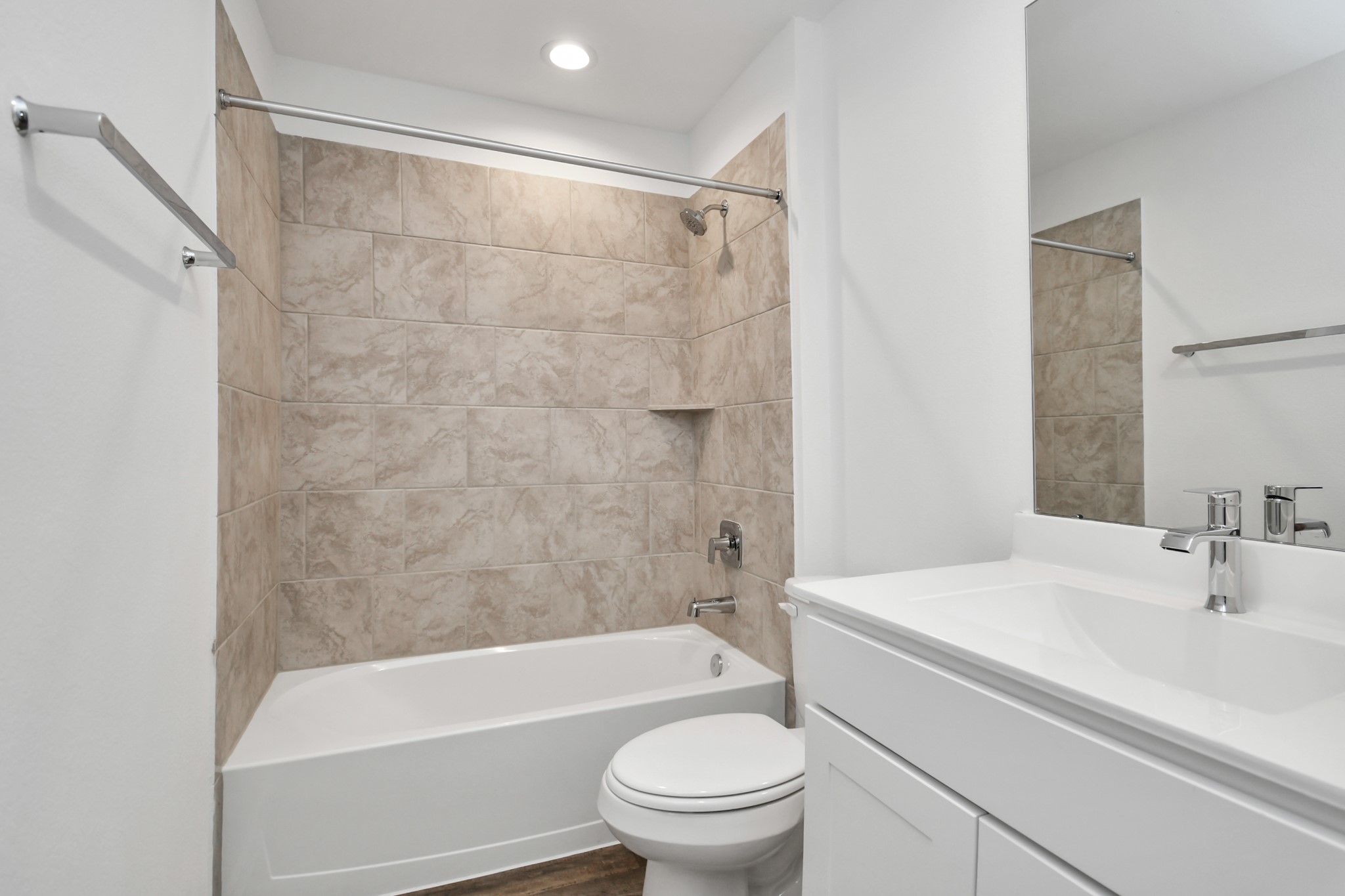 2715 Willow Gulch Way Rosenberg, TX 77469 - Photo 8 of 39 a bathroom with a sink a toilet and a bathtub