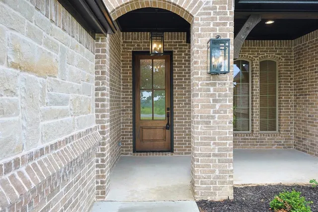 a front view of a house with a shower