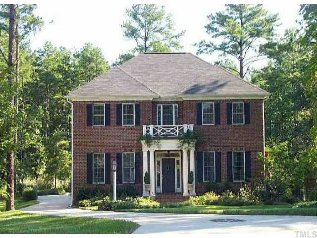 3320 Edgemont Drive Raleigh, NC 27612 - Photo 1 of 1 a front view of a house with a yard and trees