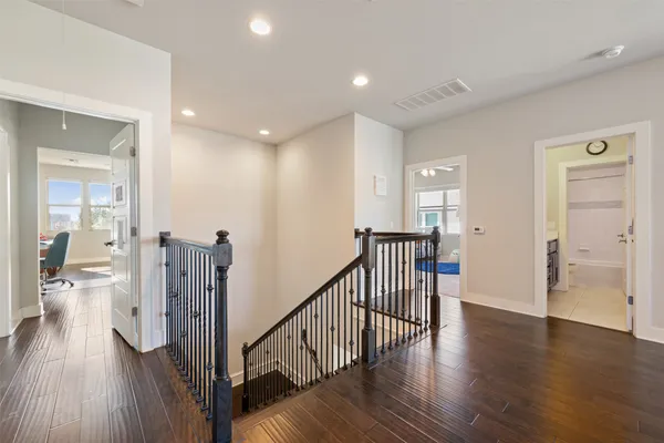 a view of entryway with wooden floor