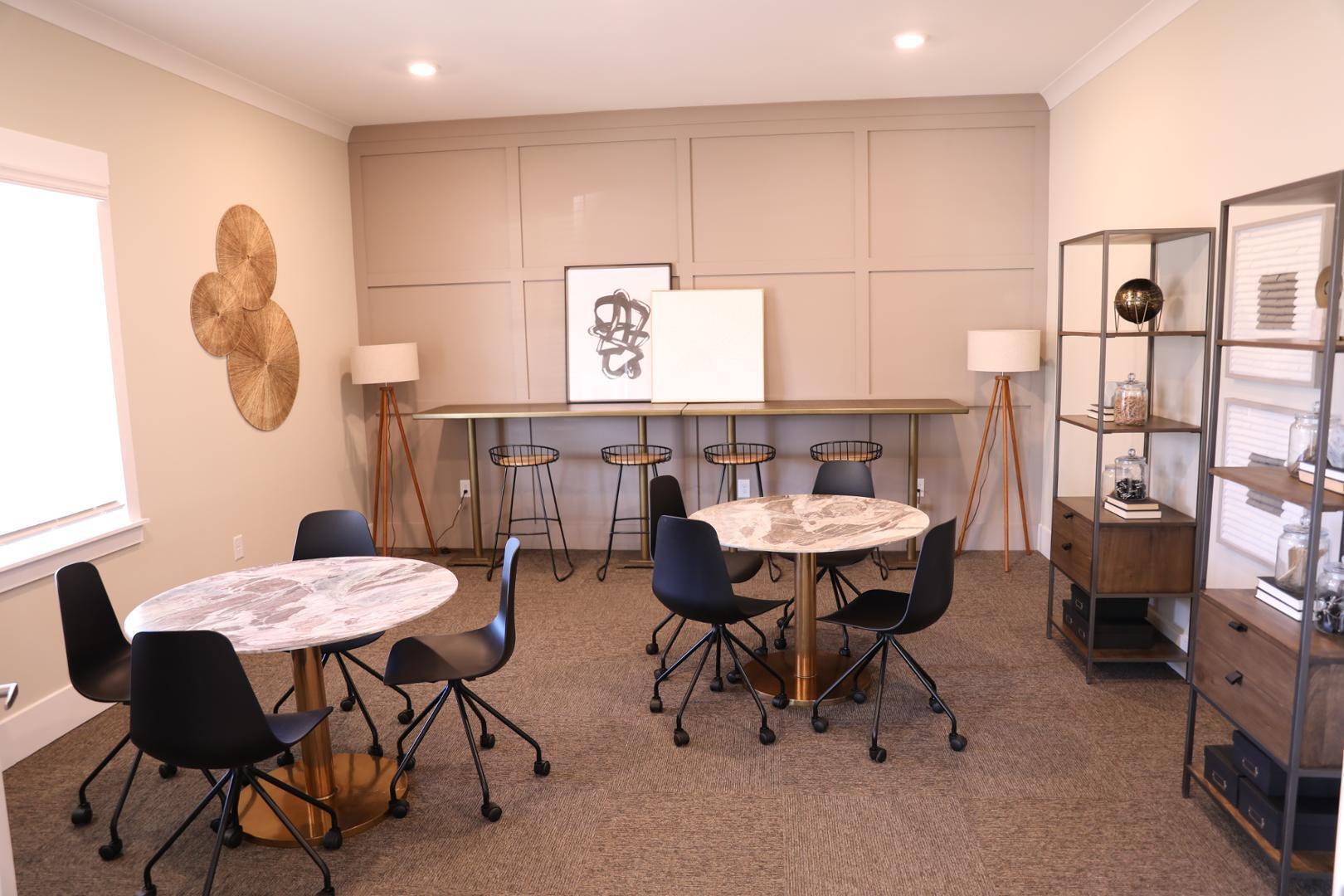210 Grove Circle, Unit 103 Lillington, NC 27546 - Photo 12 of 13 a view of a dining room with furniture and a table