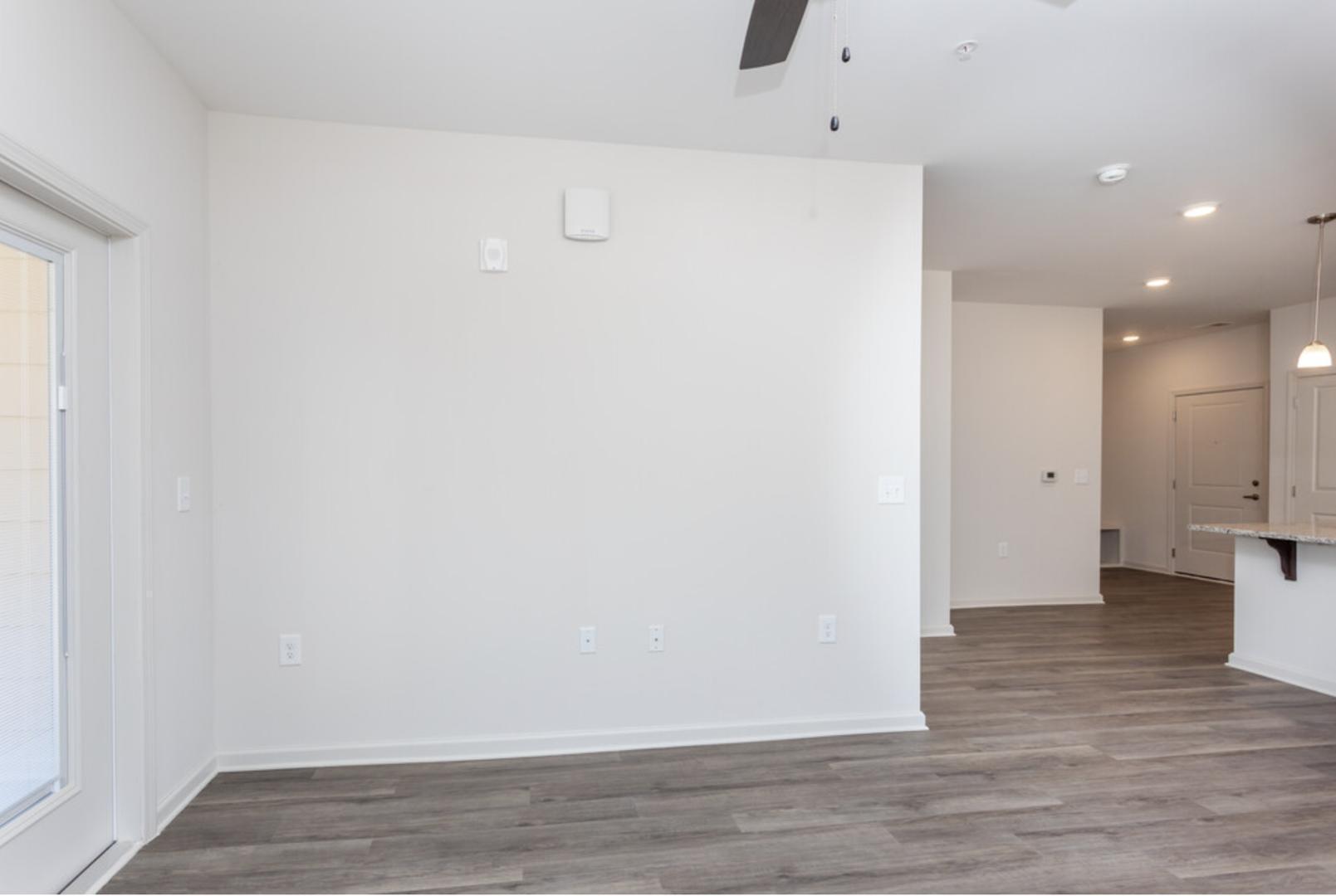 210 Grove Circle, Unit 103 Lillington, NC 27546 - Photo 5 of 13 a view of an empty room