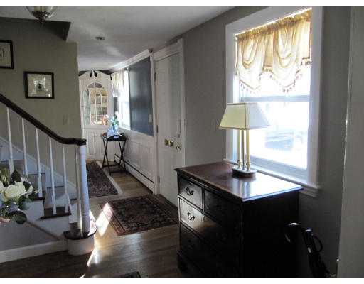 40 Pond Street Needham, MA 02492 - Photo 11 of 17 a living room with furniture and a window