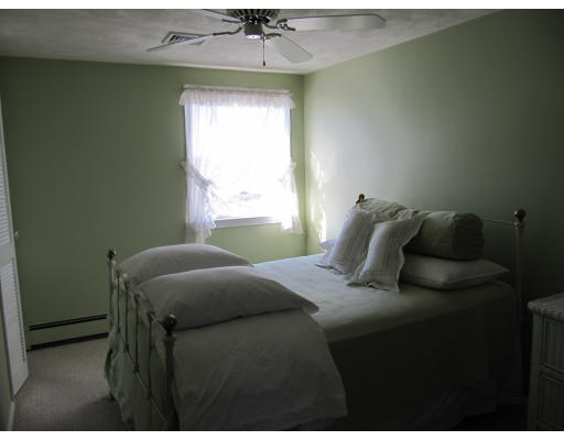 40 Pond Street Needham, MA 02492 - Photo 16 of 17 a bedroom with a bed and a window