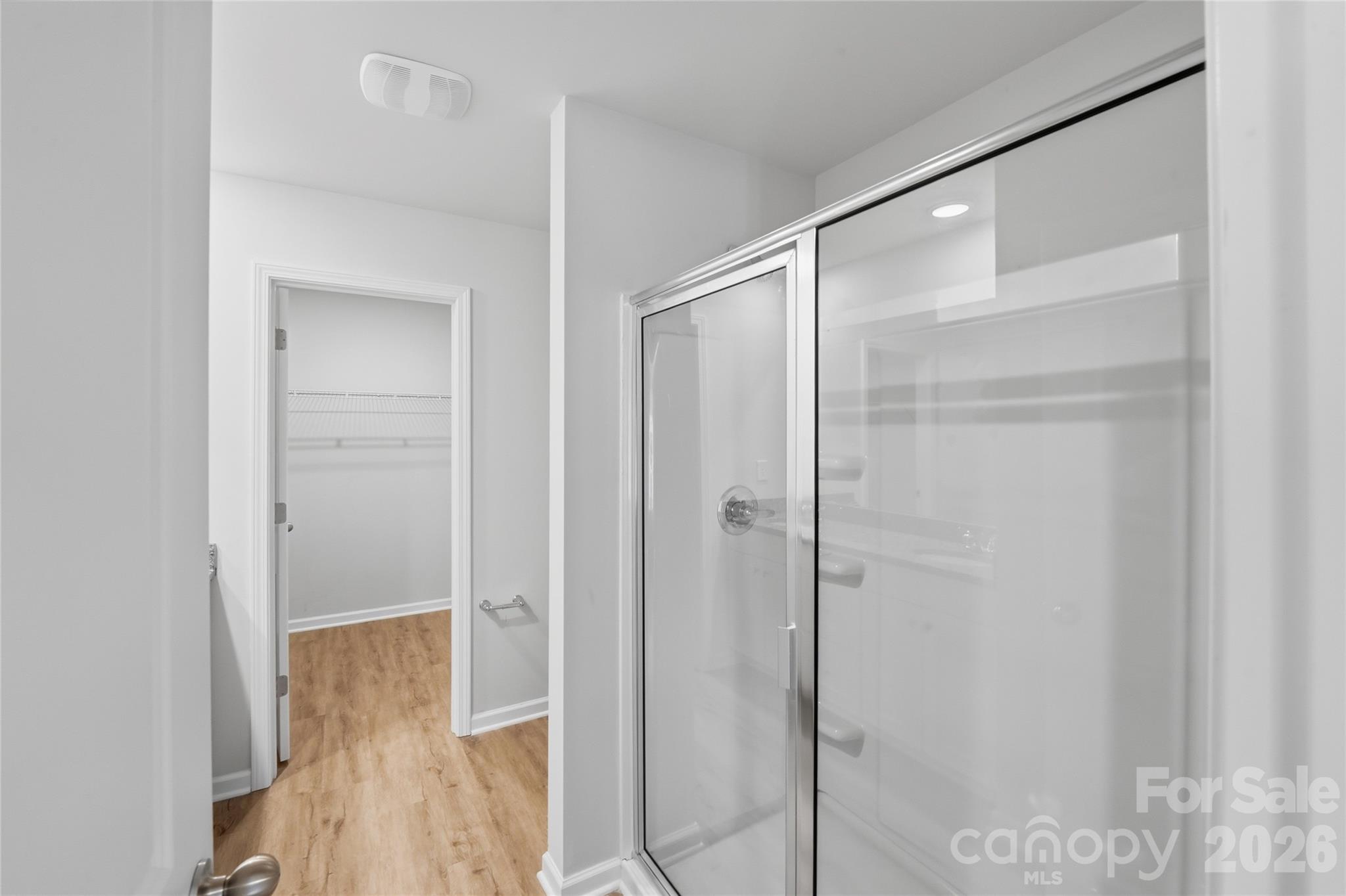 242 Landers Chapel Road Lincolnton, NC 28092 - Photo 27 of 33 a bathroom with a glass shower door