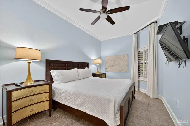 a bedroom with a bed and a couch