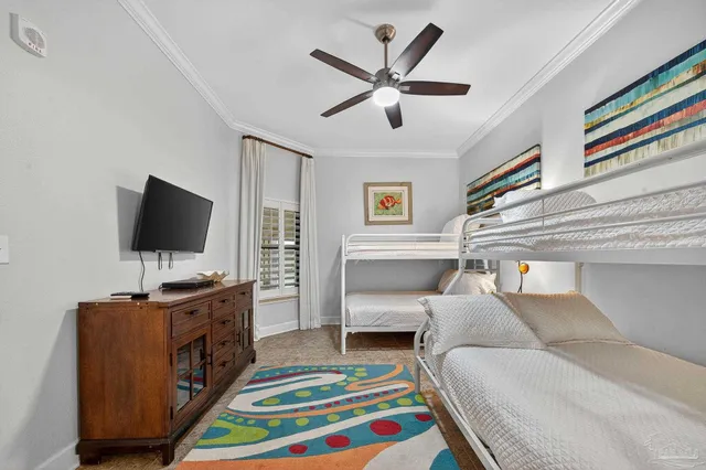 a view of a swimming pool and lounge chairs