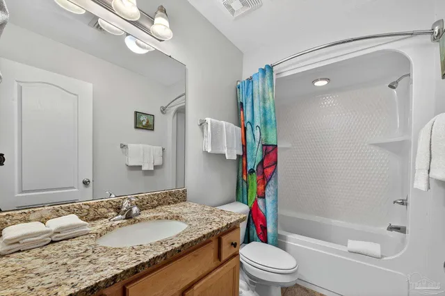 a view of swimming pool with outdoor seating and a yard