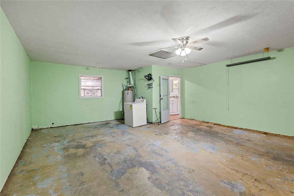 1201 Shoreham Drive Atlanta, GA 30349 - Photo 21 of 21 a view of an empty room with a window