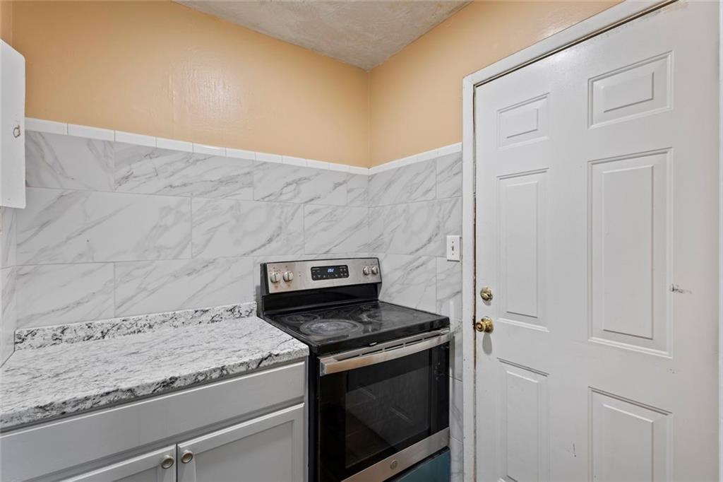 1201 Shoreham Drive Atlanta, GA 30349 - Photo 10 of 21 a view of washer and dryer