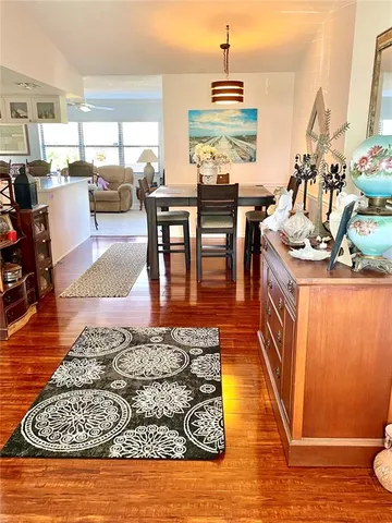 a kitchen with a stove a sink and a refrigerator