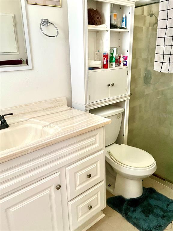 3401 Divot Road Sebring, FL 33872 - Photo 28 of 34 a bathroom with a toilet and a sink