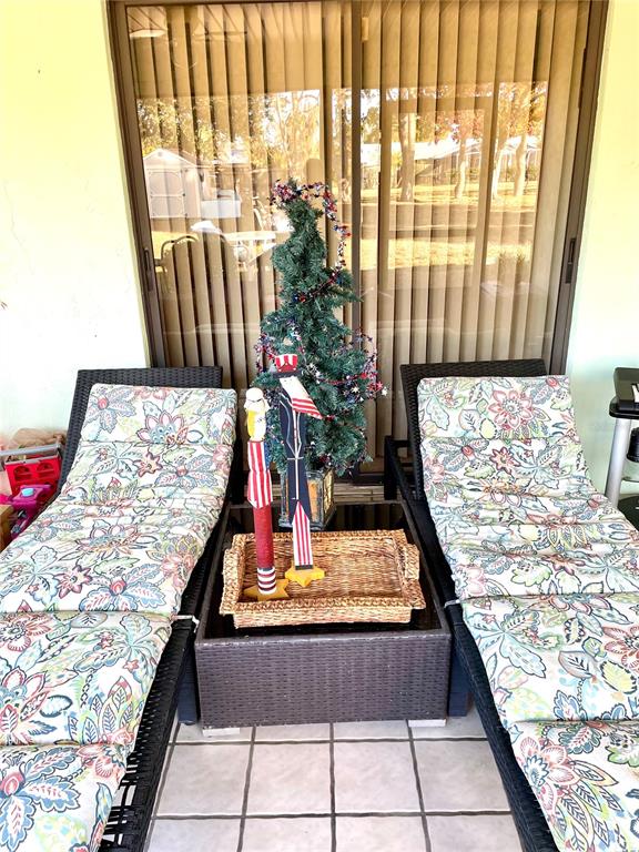 3401 Divot Road Sebring, FL 33872 - Photo 33 of 34 a bed sitting in a bedroom next to a window