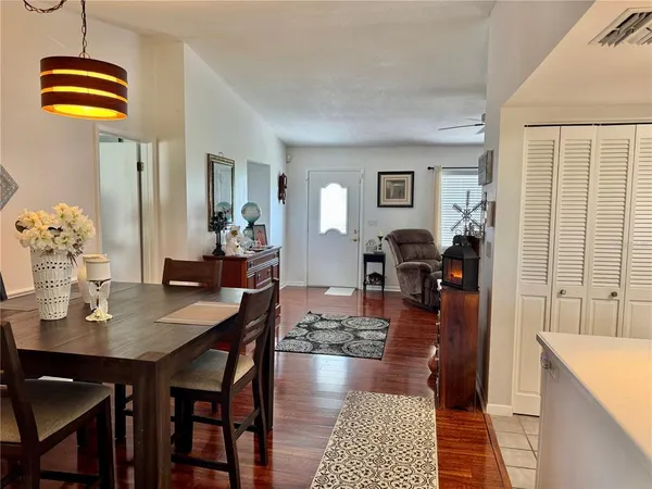 a view of a dining room with furniture