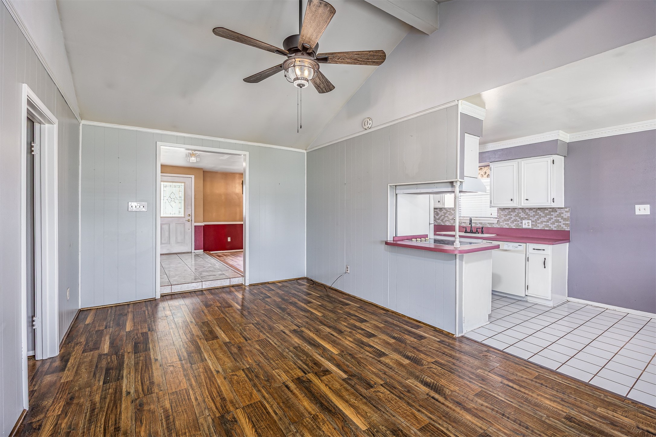 206 Kelly Lane Baytown, TX 77521 - Photo 10 of 38 A look from the living room provides a peek in the formal dining and is open to the kitchen.