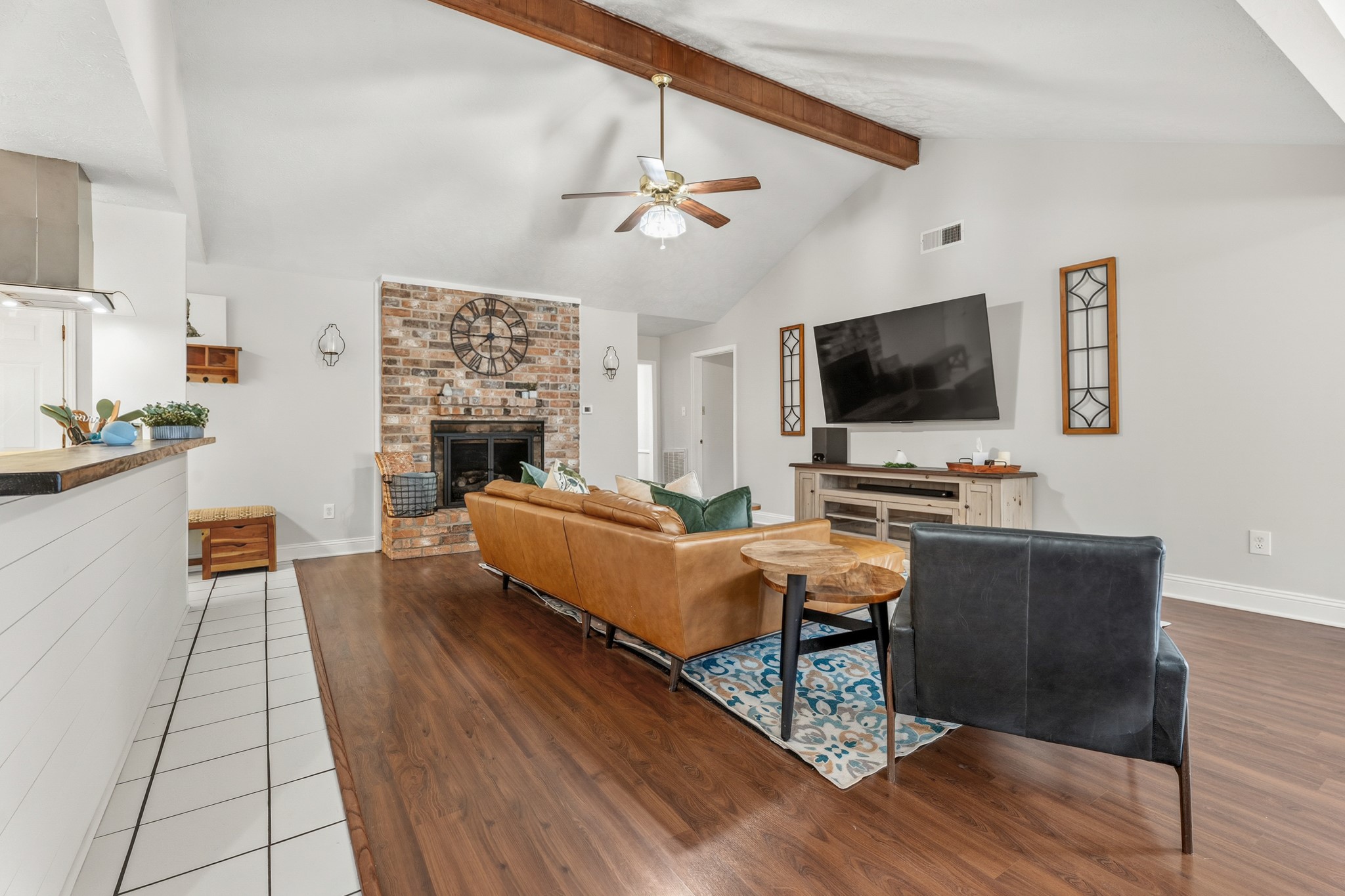 2104 Rose Road Pearland, TX 77581 - Photo 13 of 43 a living room with furniture and a flat screen tv