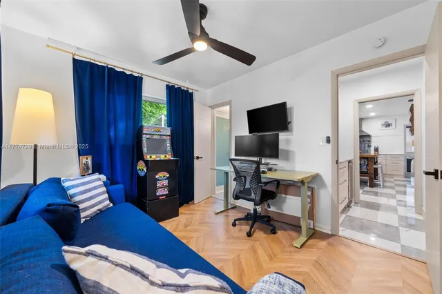 a view of swimming pool with seating space