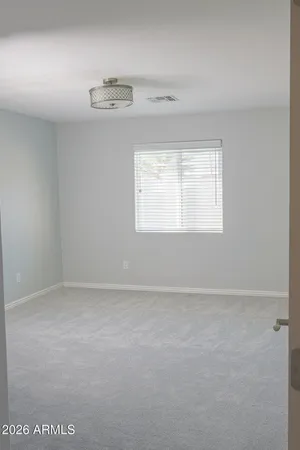 a bathroom with a toilet and a bath tub