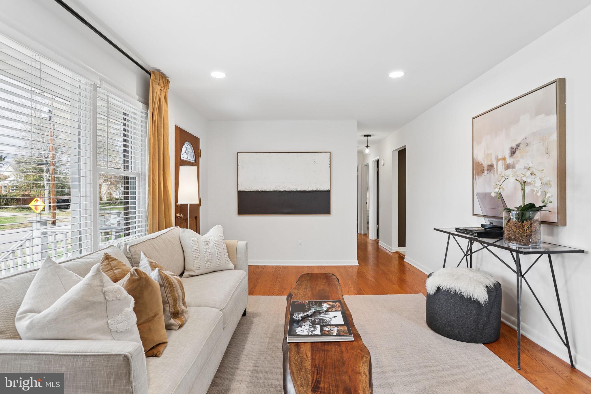 5909 Ridge View Drive Alexandria, VA 22310 - Photo 5 of 35 a living room with furniture and a large window