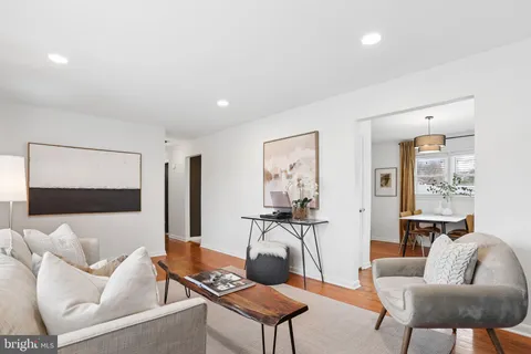 a living room with furniture and a couch