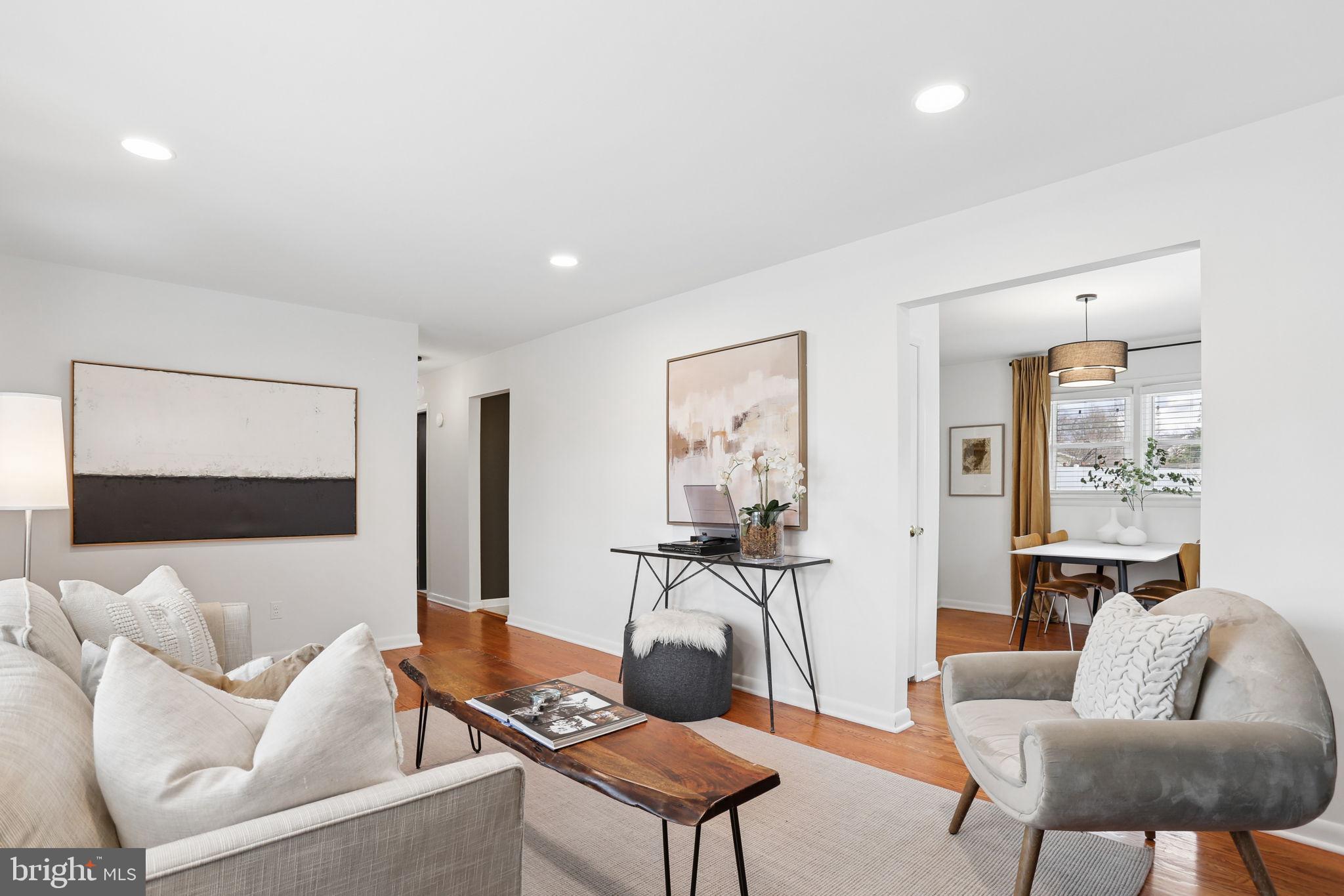 5909 Ridge View Drive Alexandria, VA 22310 - Photo 6 of 35 a living room with furniture and a couch