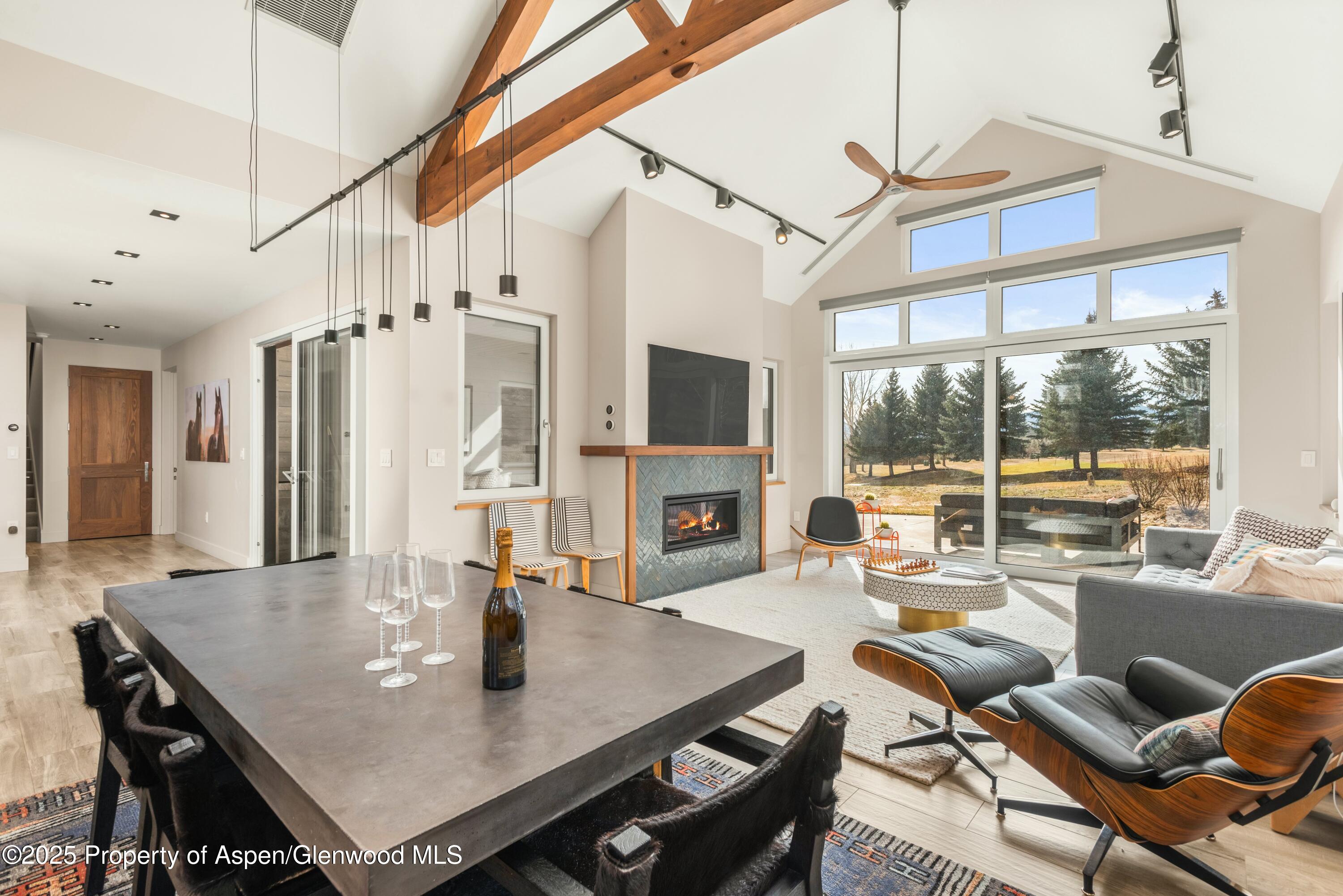 649 Saddleback Road Carbondale, CO 81623 - Photo 11 of 37 a view of a dining room with furniture window and outside view