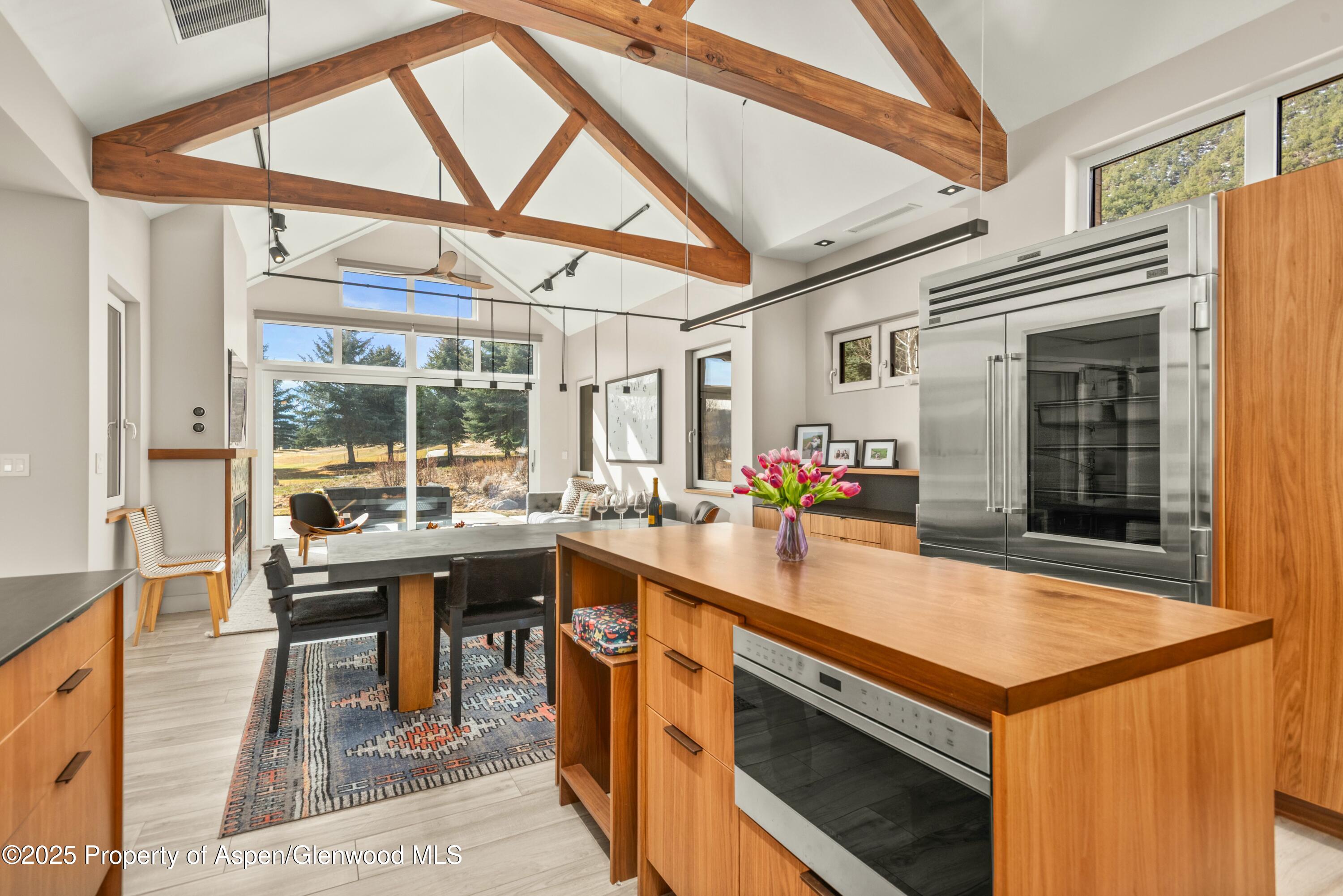 649 Saddleback Road Carbondale, CO 81623 - Photo 17 of 37 a kitchen with a stove a sink and a refrigerator