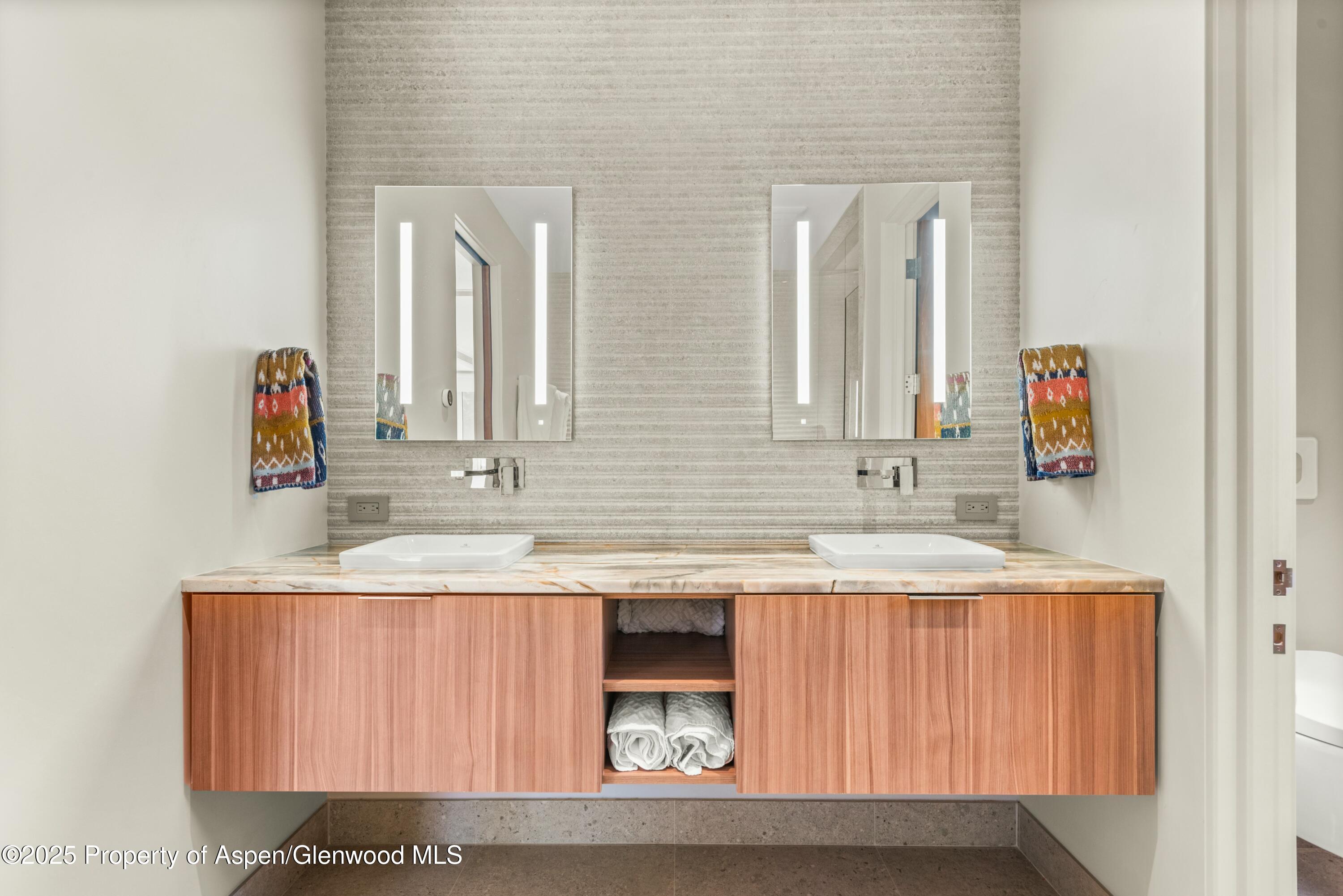 649 Saddleback Road Carbondale, CO 81623 - Photo 21 of 37 a bathroom with a sink and a mirror