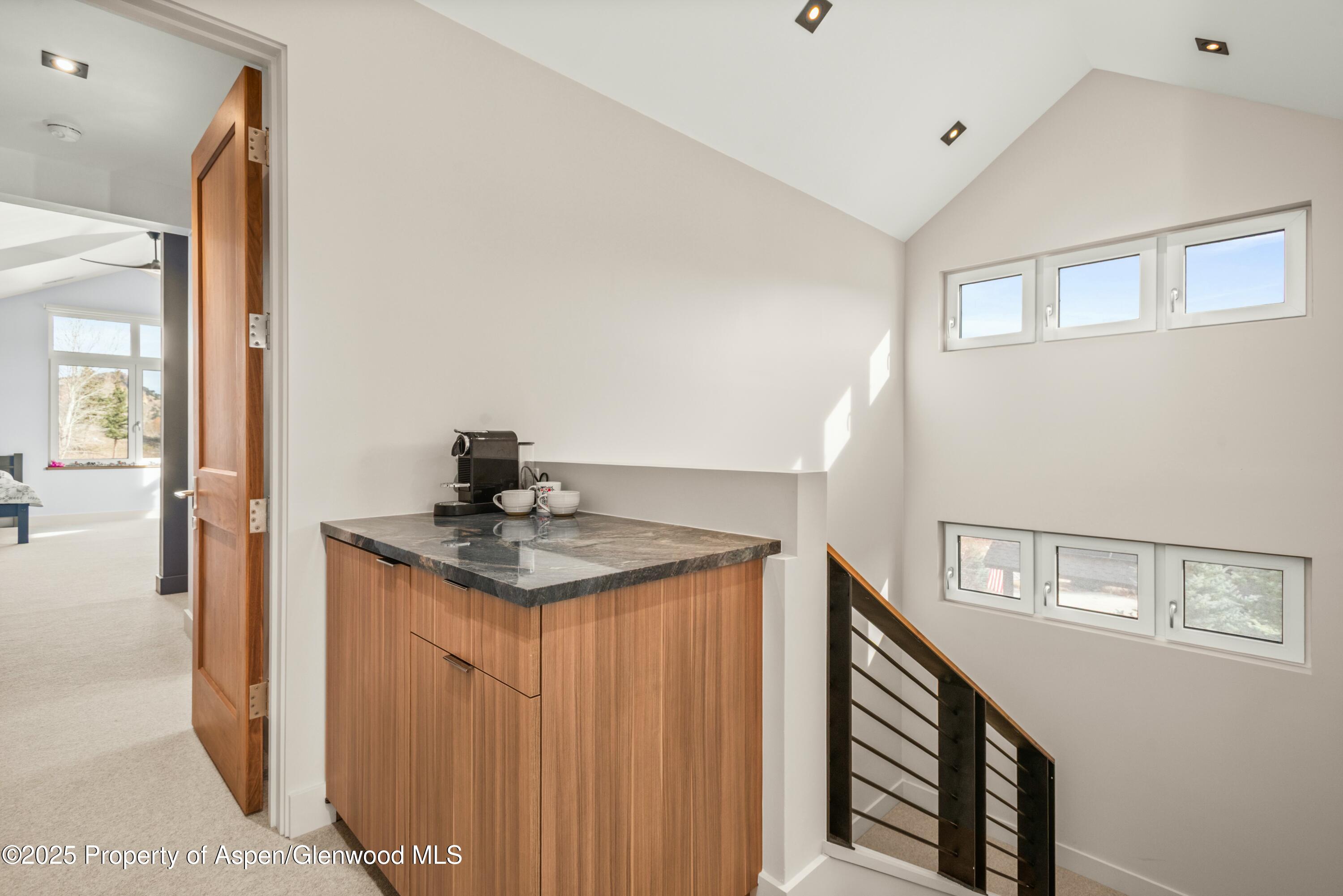 649 Saddleback Road Carbondale, CO 81623 - Photo 23 of 37 a kitchen with a sink and a refrigerator