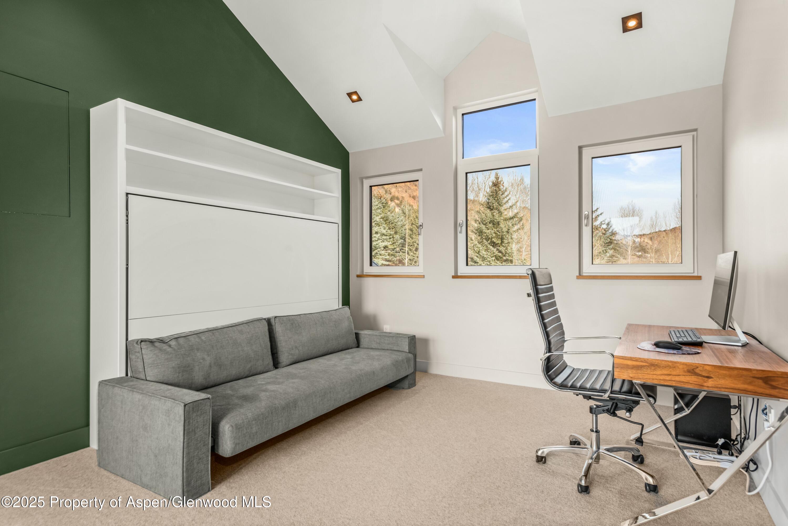 649 Saddleback Road Carbondale, CO 81623 - Photo 30 of 37 a living room with furniture and a window