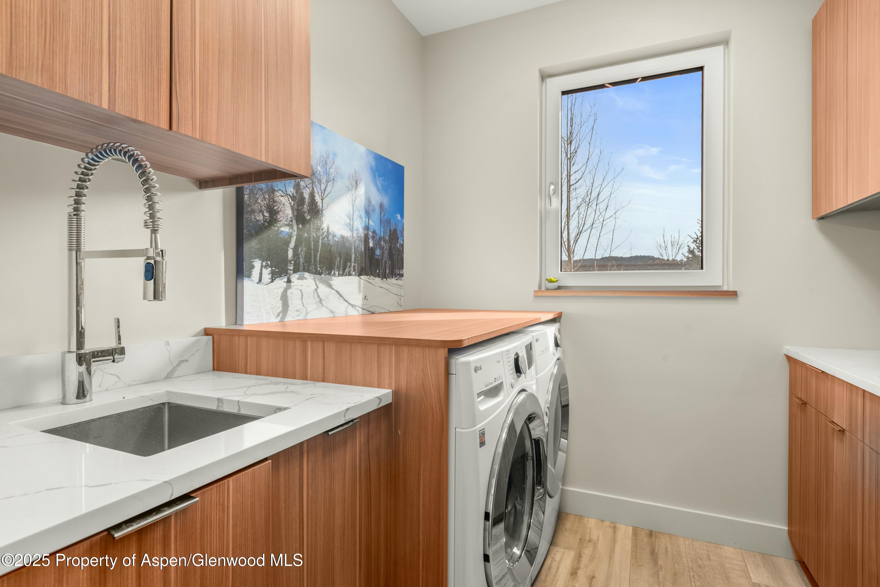 649 Saddleback Road Carbondale, CO 81623 - Photo 35 of 37 a utility room with dryer and washer