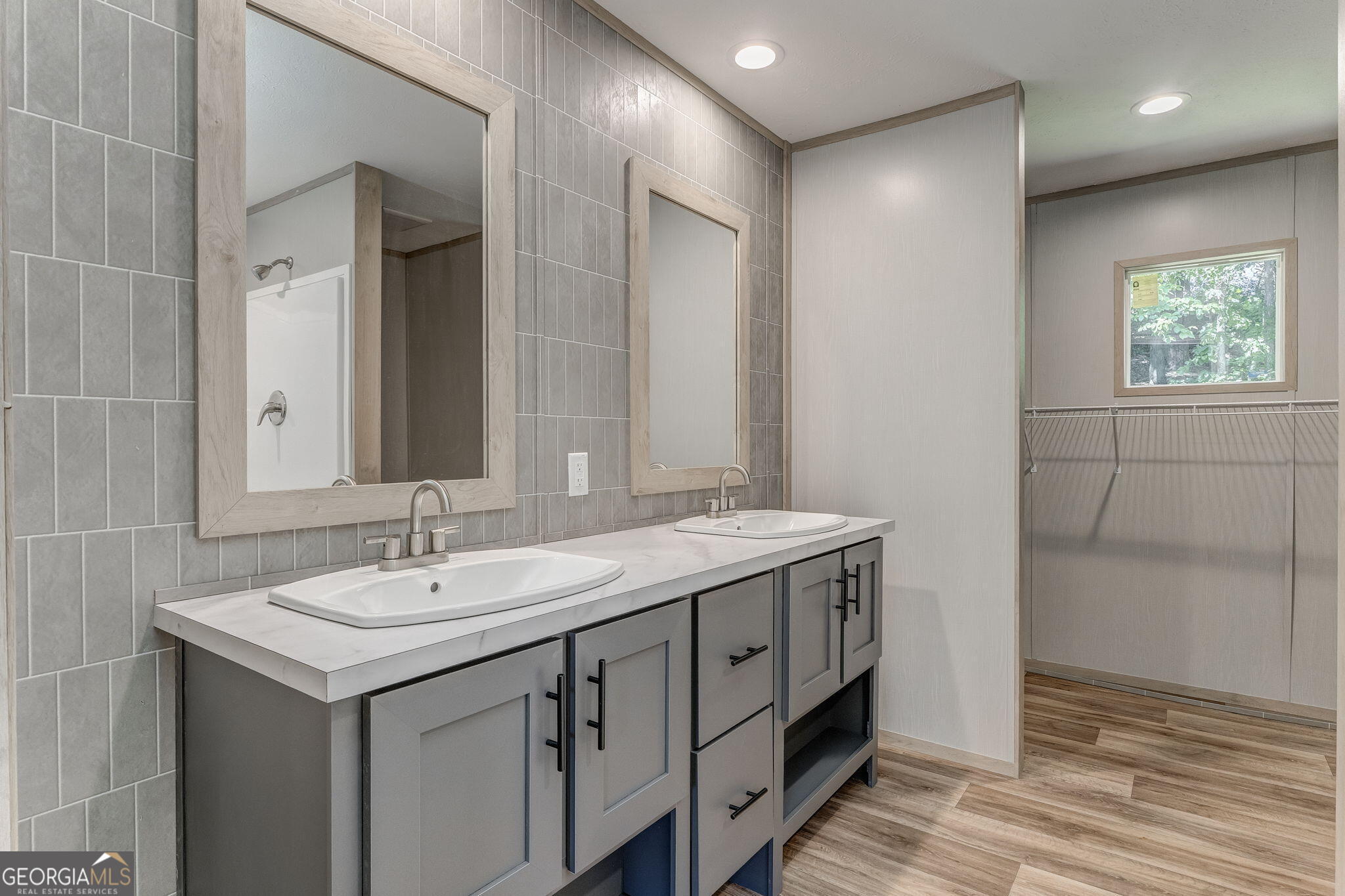865 Old Rockmart Road Southeast Silver Creek, GA 30173 - Photo 17 of 52 a bathroom with a sink and a mirror