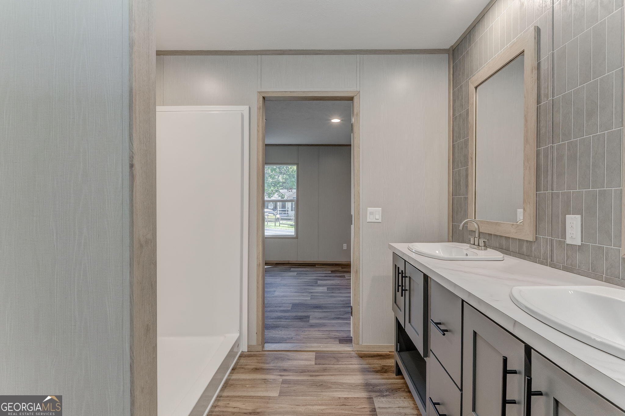 865 Old Rockmart Road Southeast Silver Creek, GA 30173 - Photo 18 of 52 a bathroom with a sink and a mirror