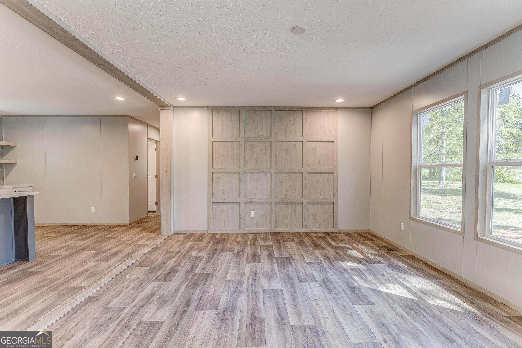 865 Old Rockmart Road Southeast Silver Creek, GA 30173 - Photo 21 of 52 an empty room with wooden floor and windows