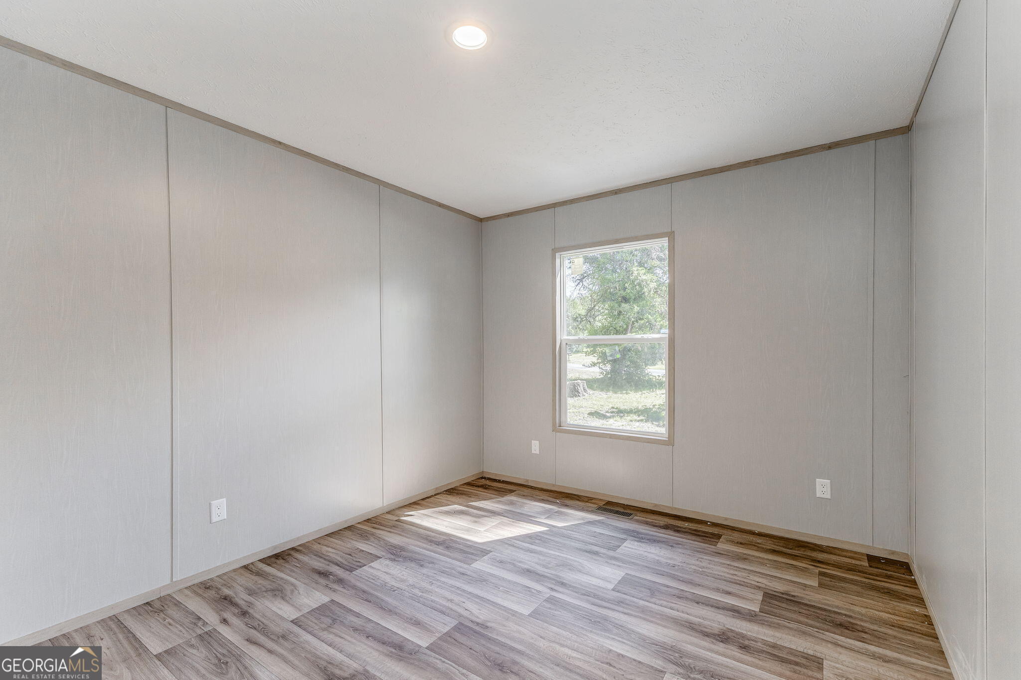 865 Old Rockmart Road Southeast Silver Creek, GA 30173 - Photo 34 of 52 a view of empty room with wooden floor and fan