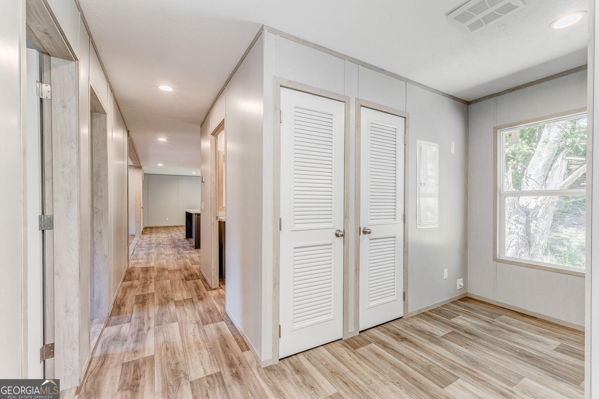865 Old Rockmart Road Southeast Silver Creek, GA 30173 - Photo 38 of 52 a view of a hallway with wooden floor and closet